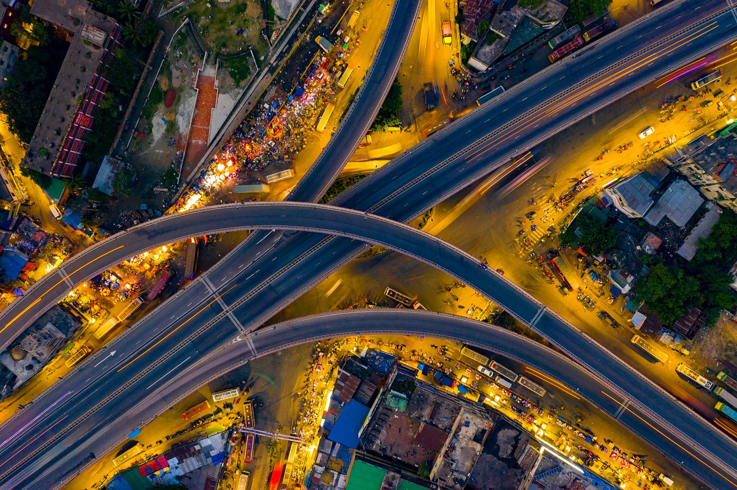a photograph of intertwining highway roads taken from above