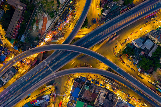 a photograph of intertwining highway roads taken from above