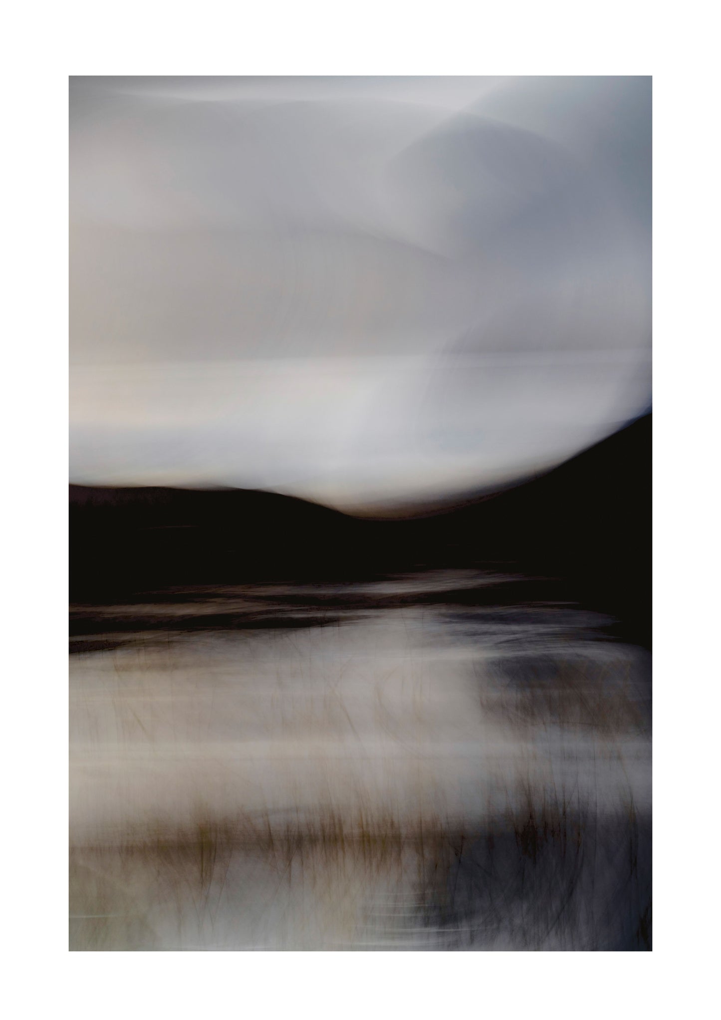 Abstract landscape with blurred sky and water reflection