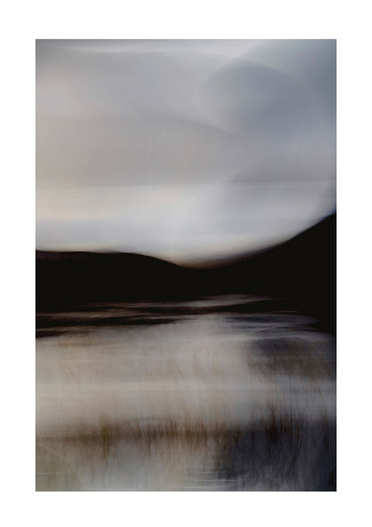 Abstract landscape with blurred sky and water reflection