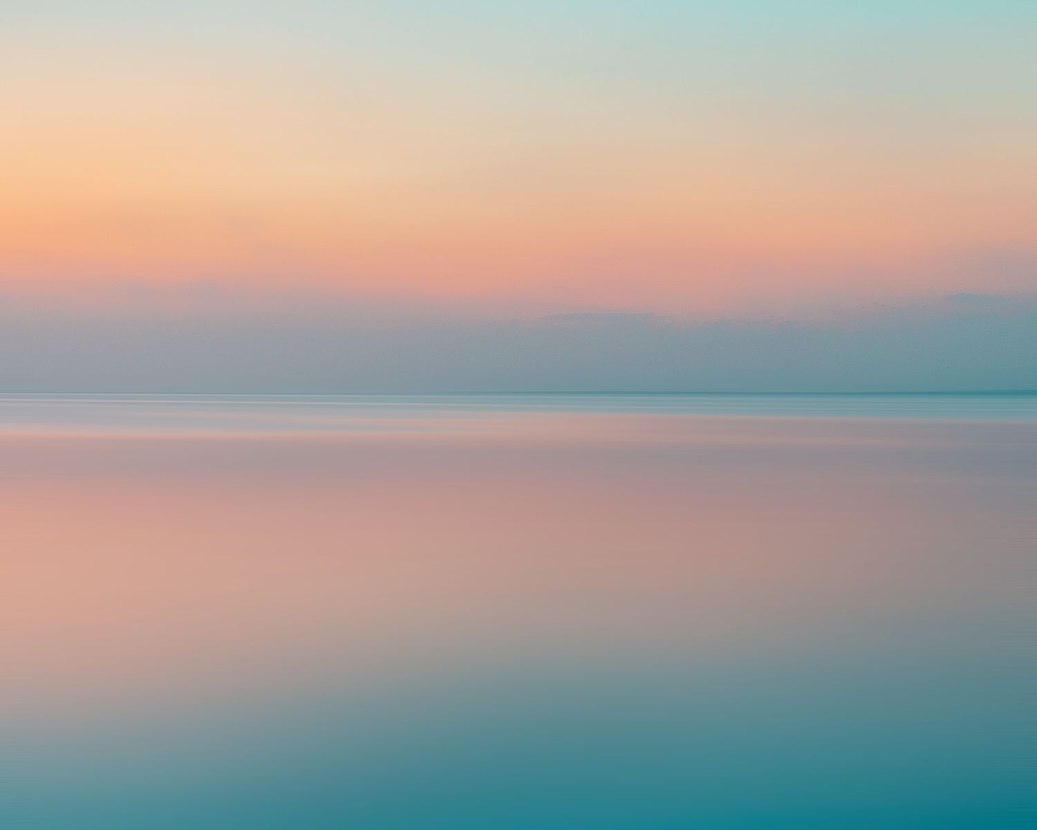 an abstract photography of a seascape during a sunrise or sunset.