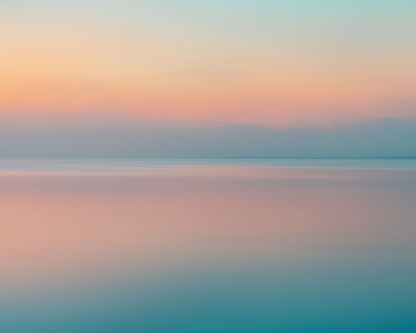 an abstract photography of a seascape during a sunrise or sunset.