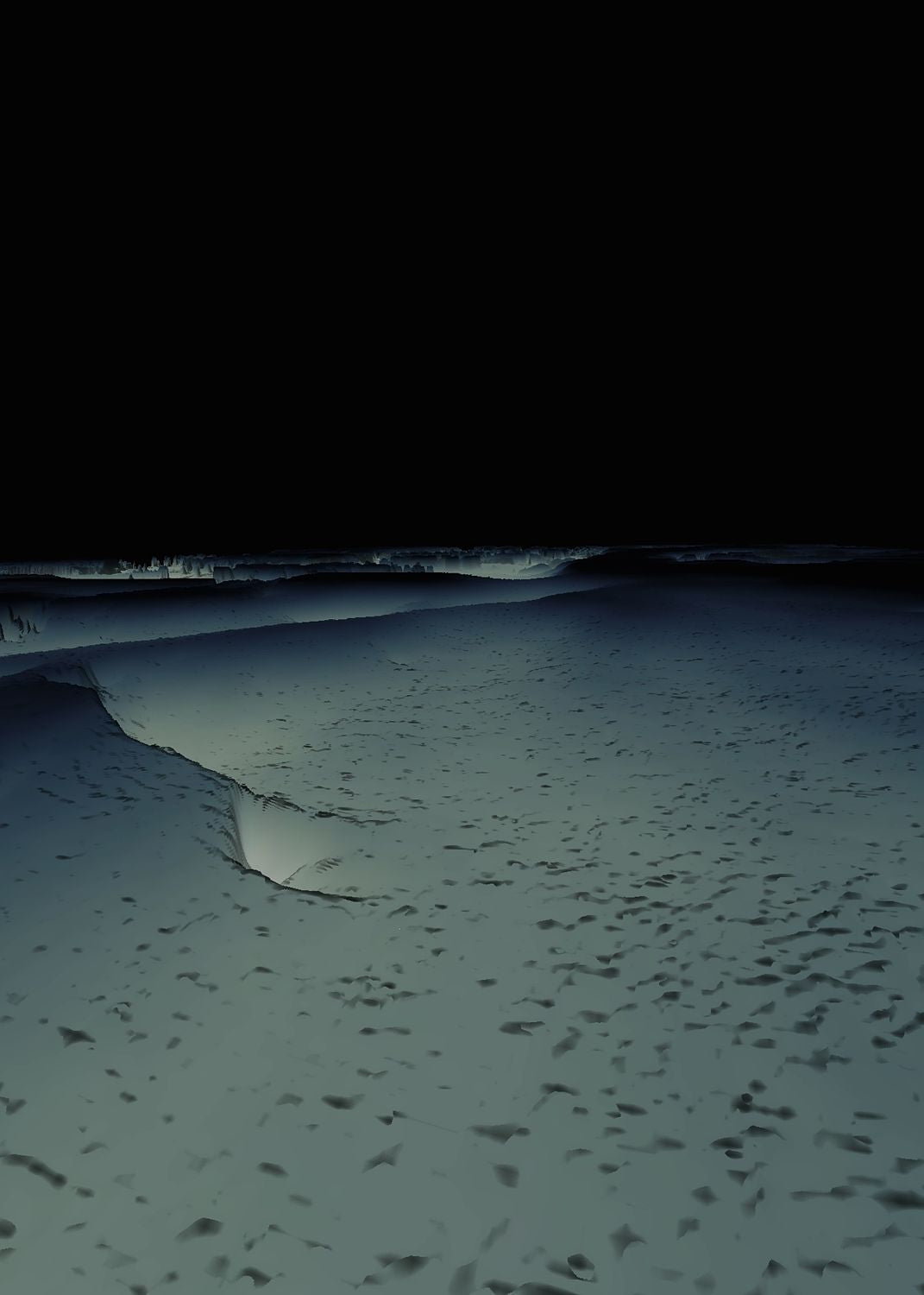 An image of a beach at night with visible waves and shadows.