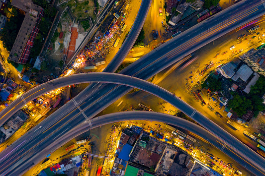 a photograph of intertwining highway roads taken from above